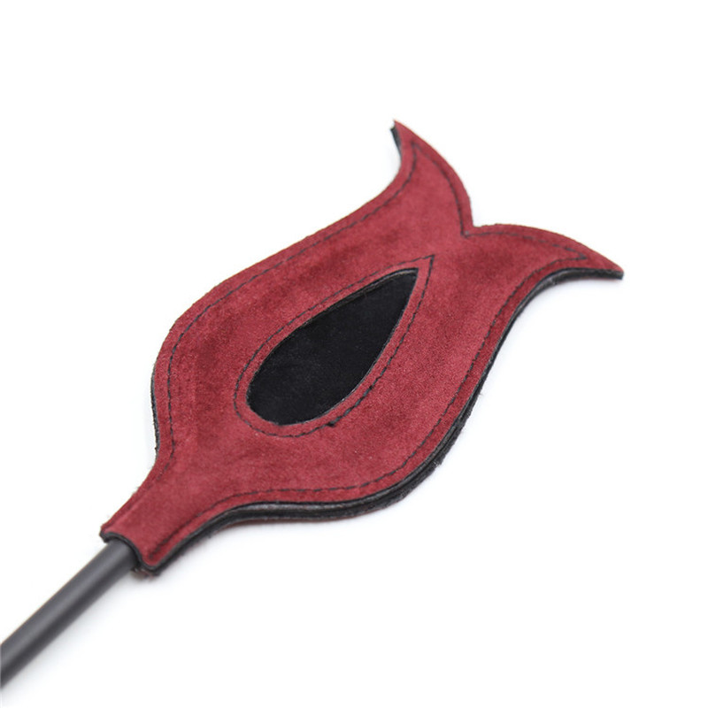 (image for) Tickler With Paddle Teaser